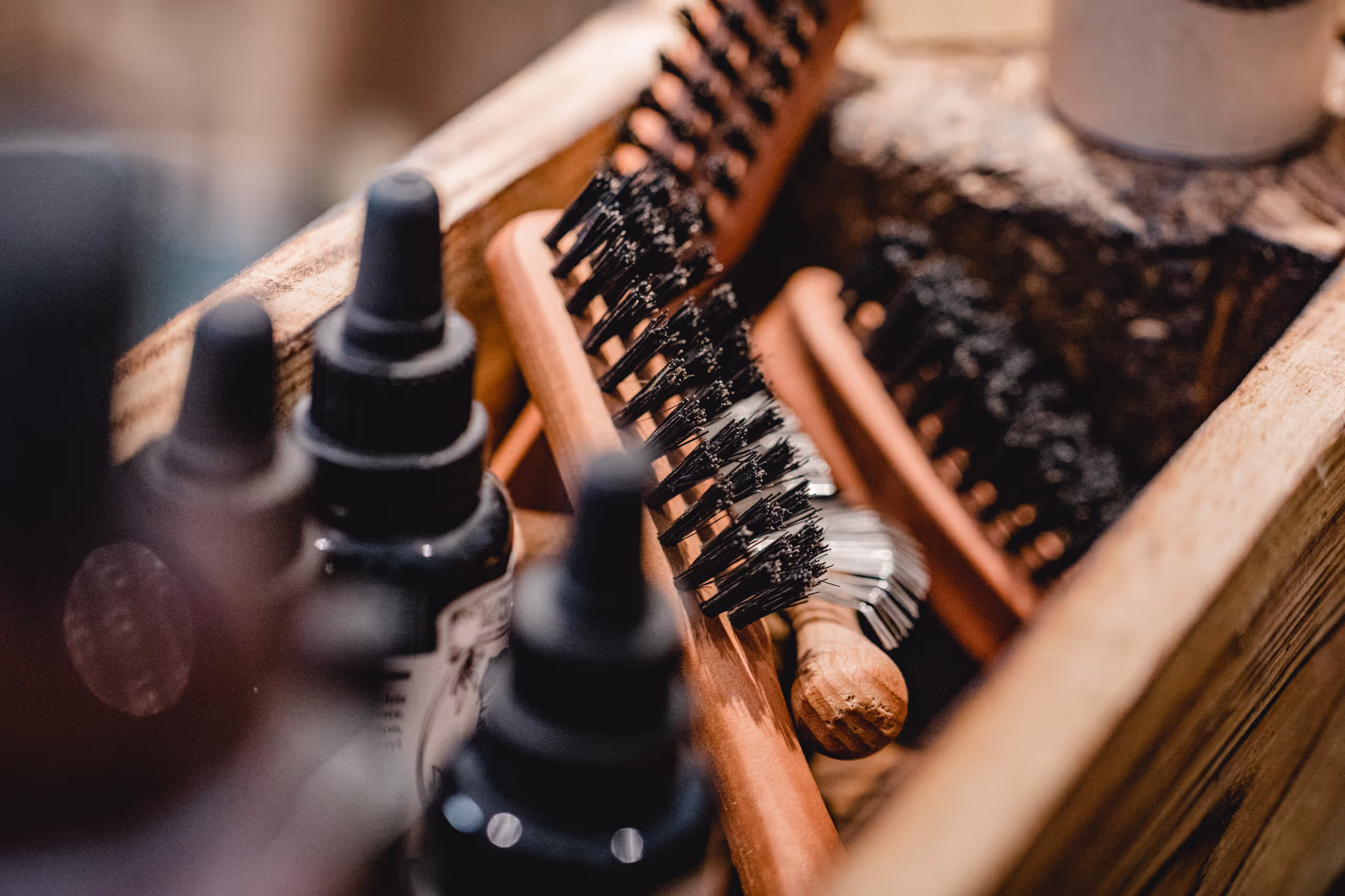 A selection of beard oils and brushes